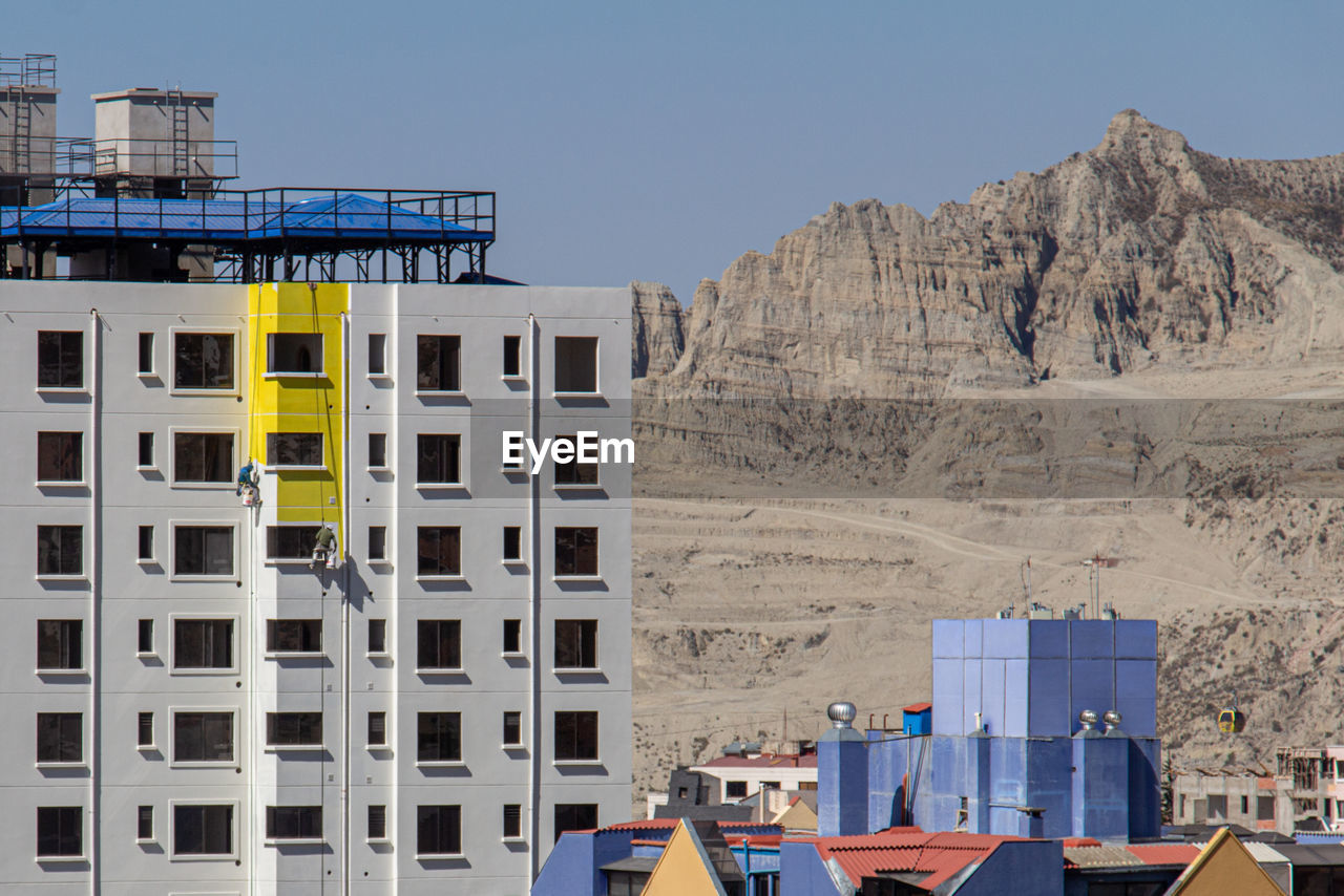 Painting building against clear blue sky and mountain high altitude