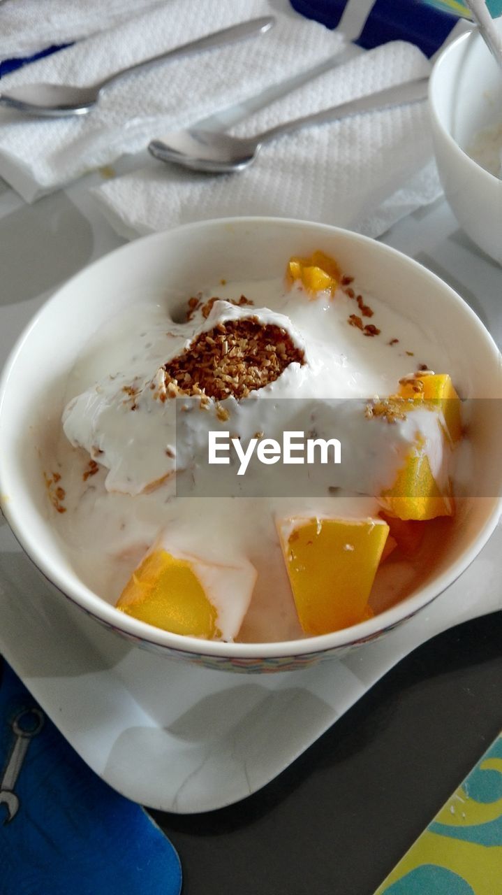 CLOSE-UP OF SOUP IN BOWL ON TABLE