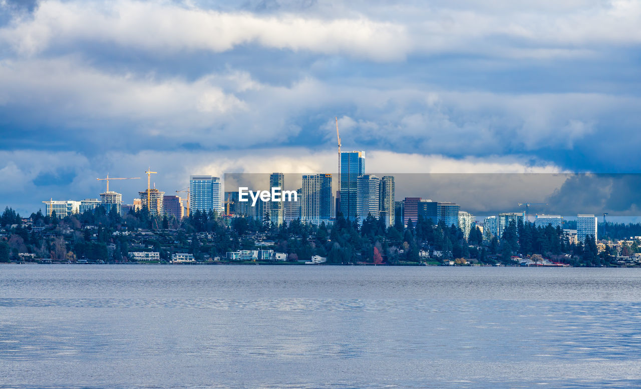 Puffy clouds hang over the bellevue skyline in washingoton state.