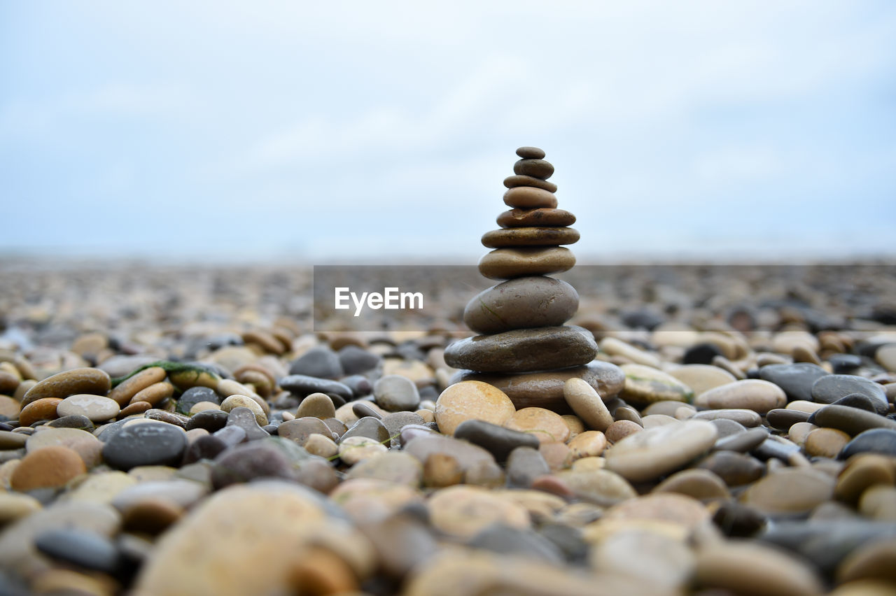 STACK OF STONES ON PEBBLES