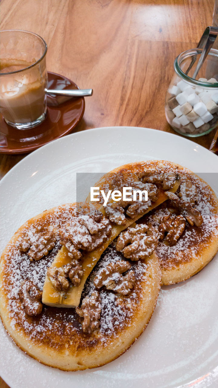 HIGH ANGLE VIEW OF DESSERT SERVED ON PLATE