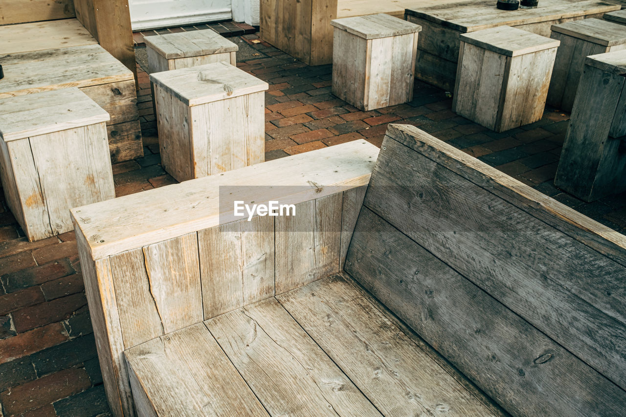 Full frame shot of wooden bench and tables