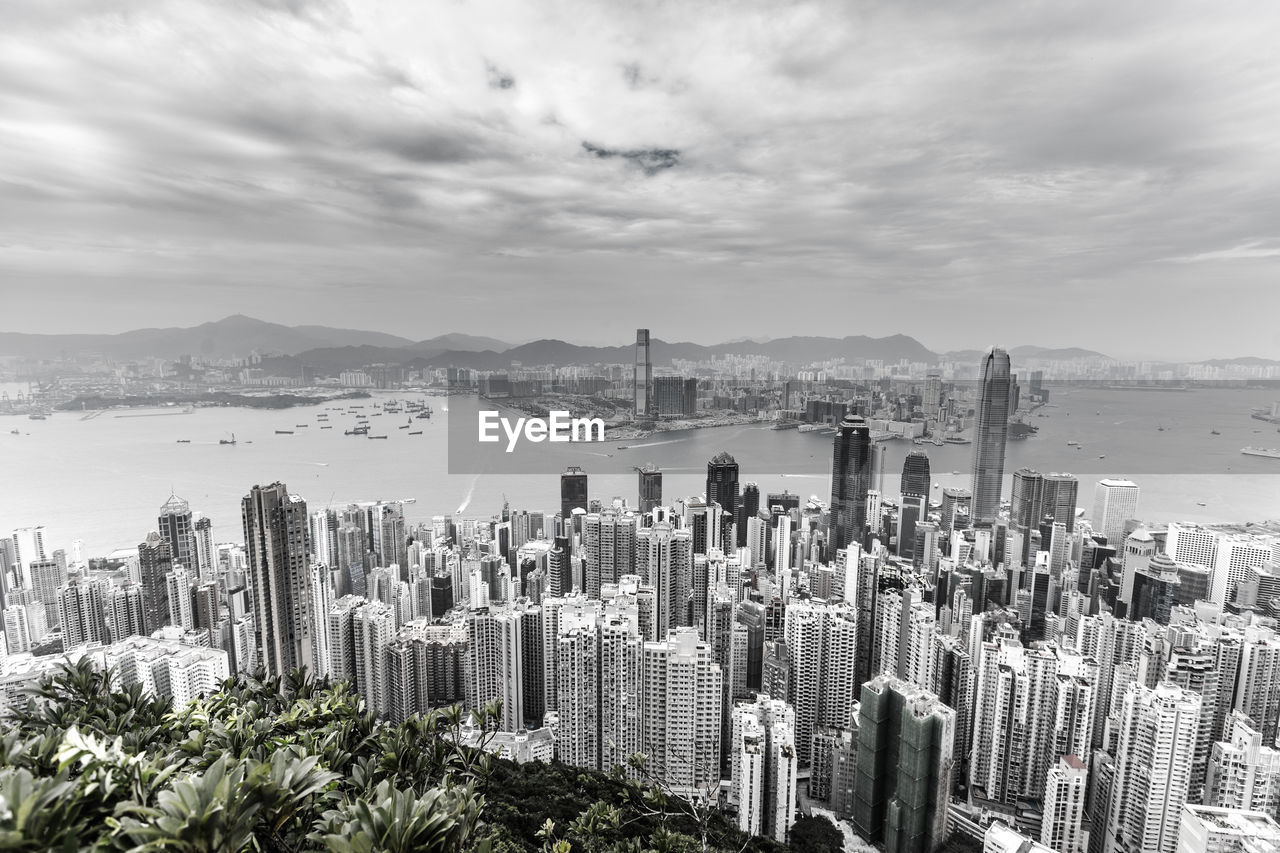 Panoramic view of city buildings against sky