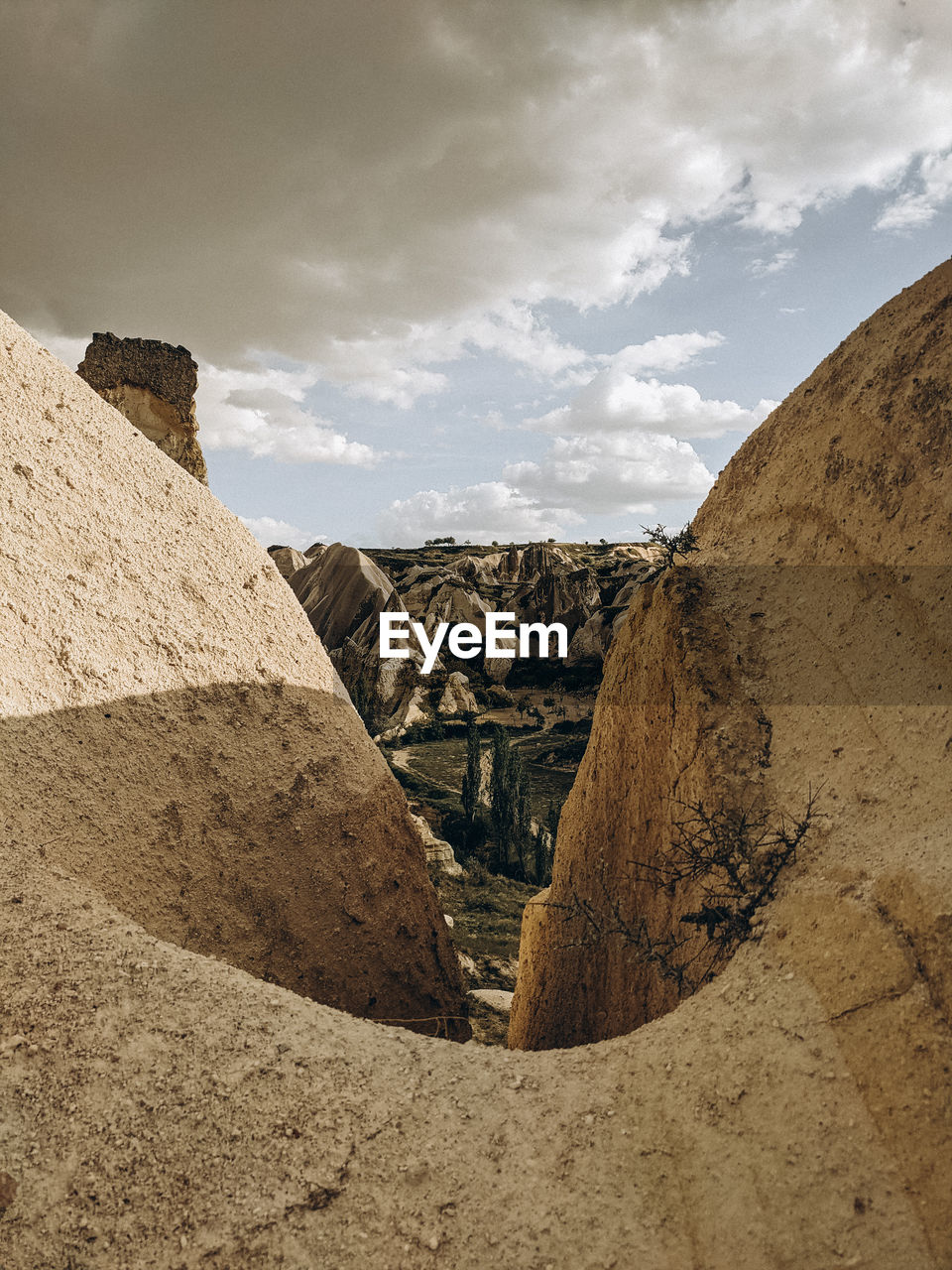 Rock formations on landscape against sky