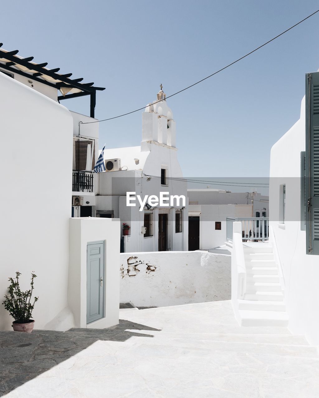 WHITE BUILDINGS AGAINST SKY