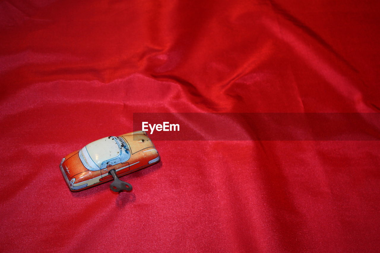 High angle view of red oldtimer toy