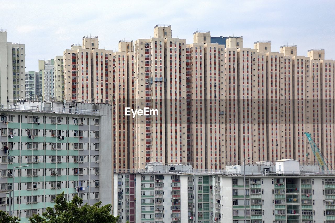 Different types of residential buildings under clear sky 