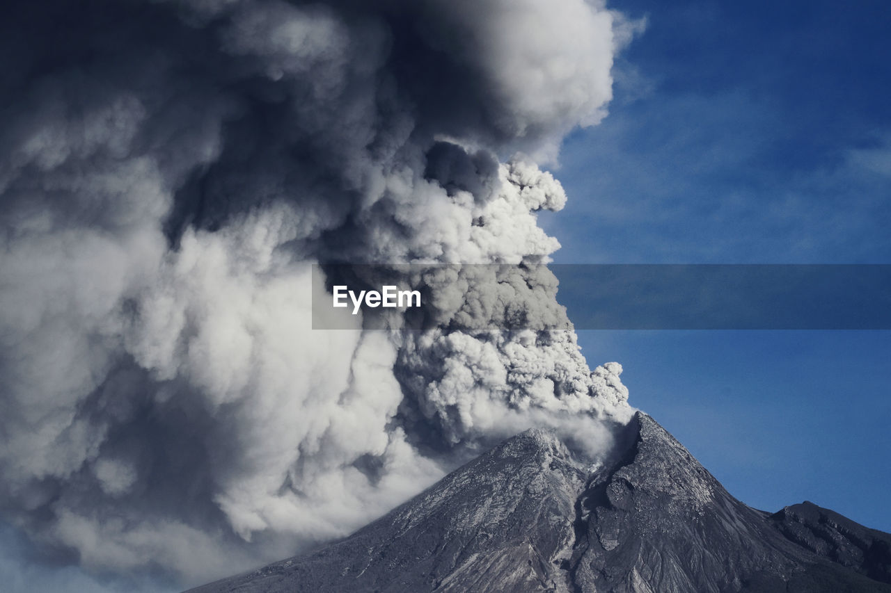 Smoke emitting from volcanic eruption, mt. merapi - indonesia
