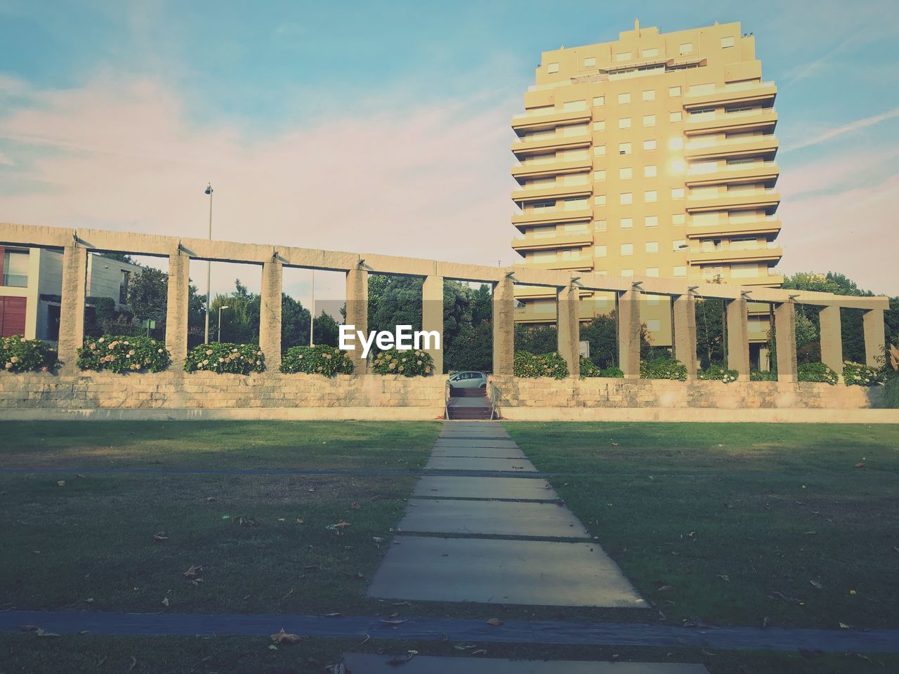 FOOTPATH BY BUILDING AGAINST SKY