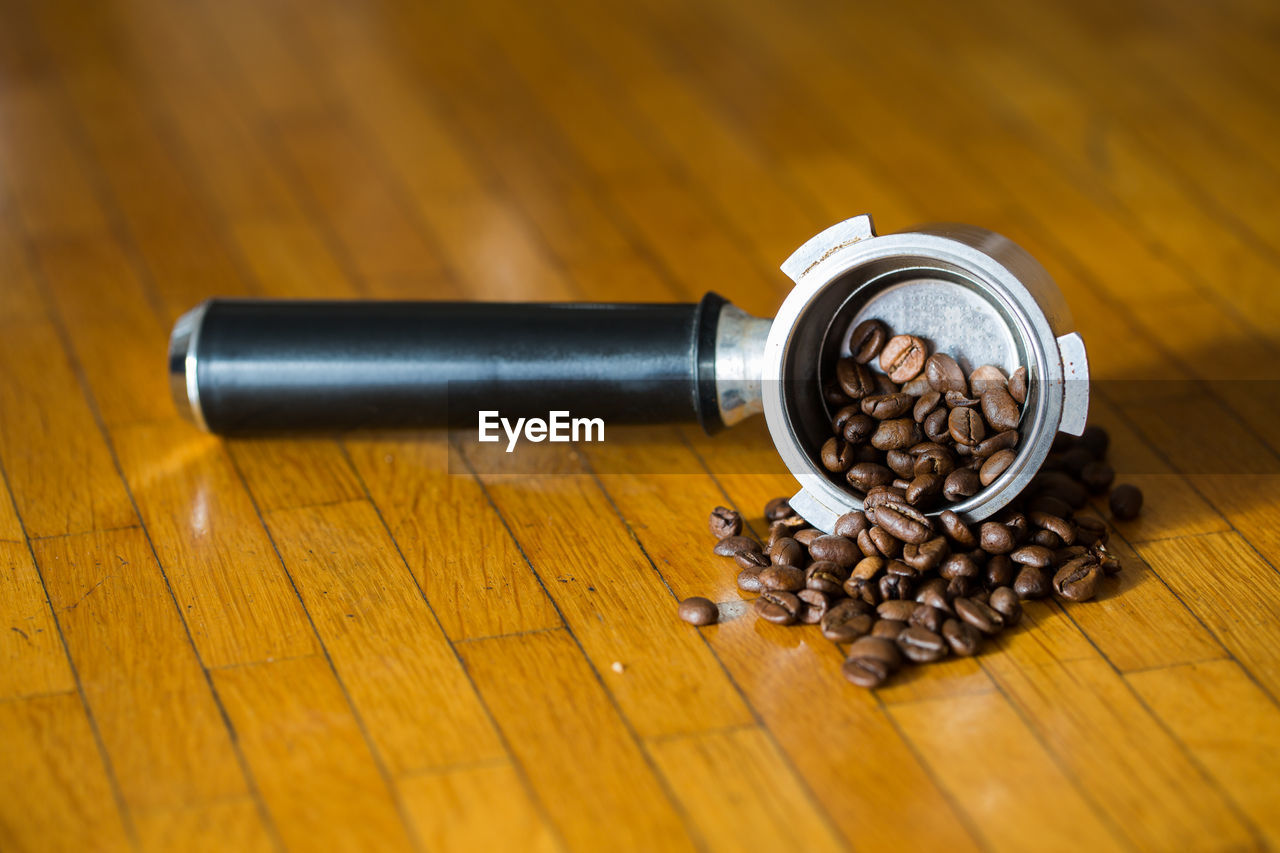 Close-up of coffee beans with pota filter