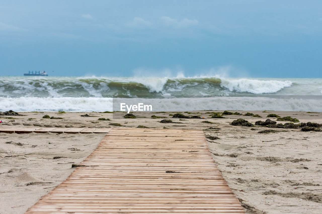 Scenic view of beach against sky