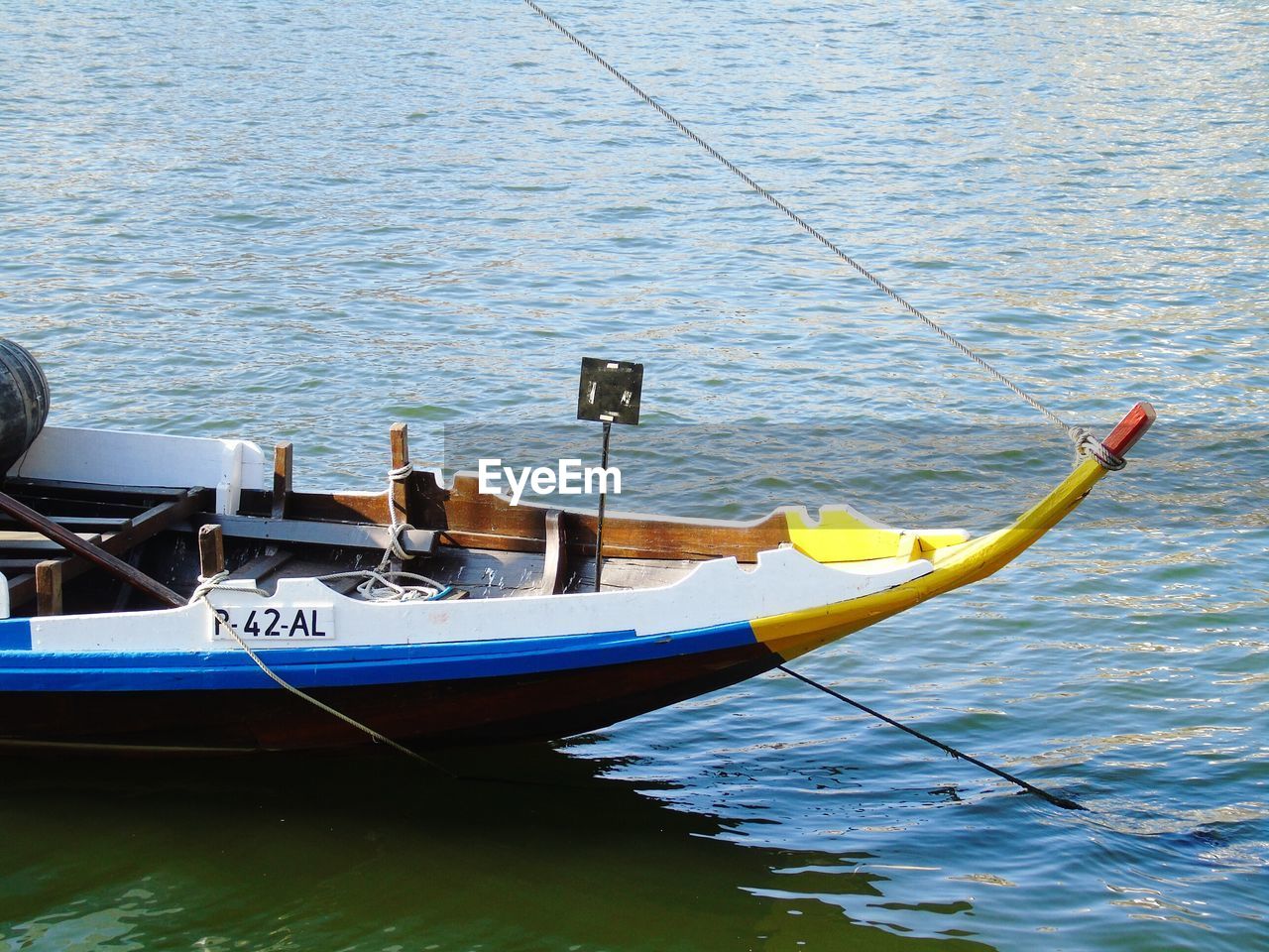 BOATS MOORED AT SEA