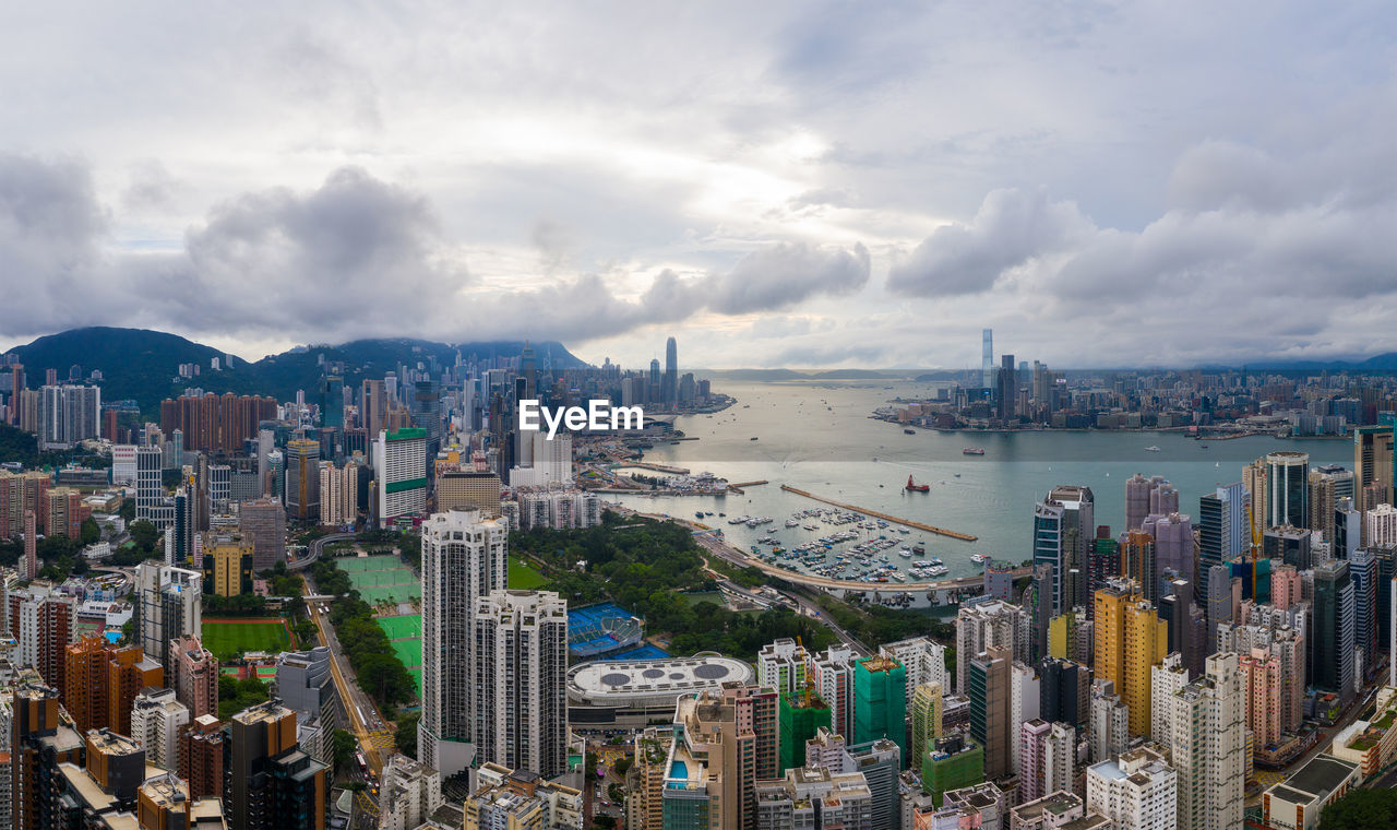 Panoramic view of city buildings against sky