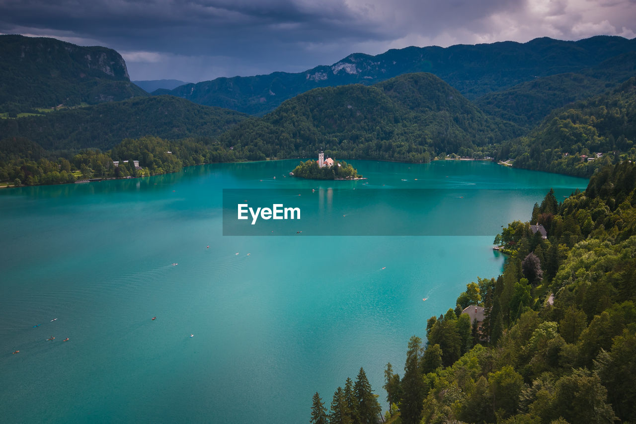 Panoramic view of little island in the bled lake during summer storm in slovenia