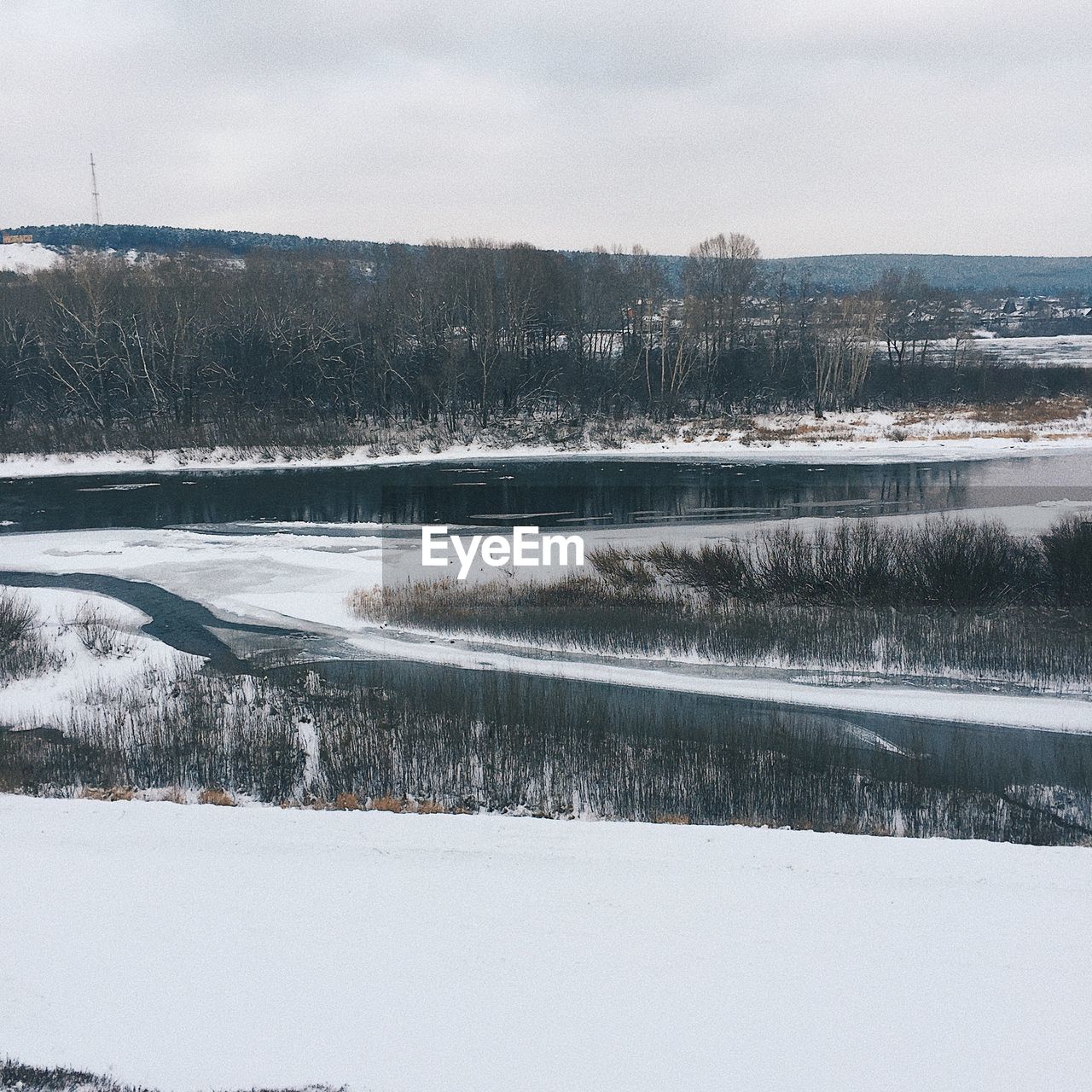 SCENIC VIEW OF SNOW COVERED LAND