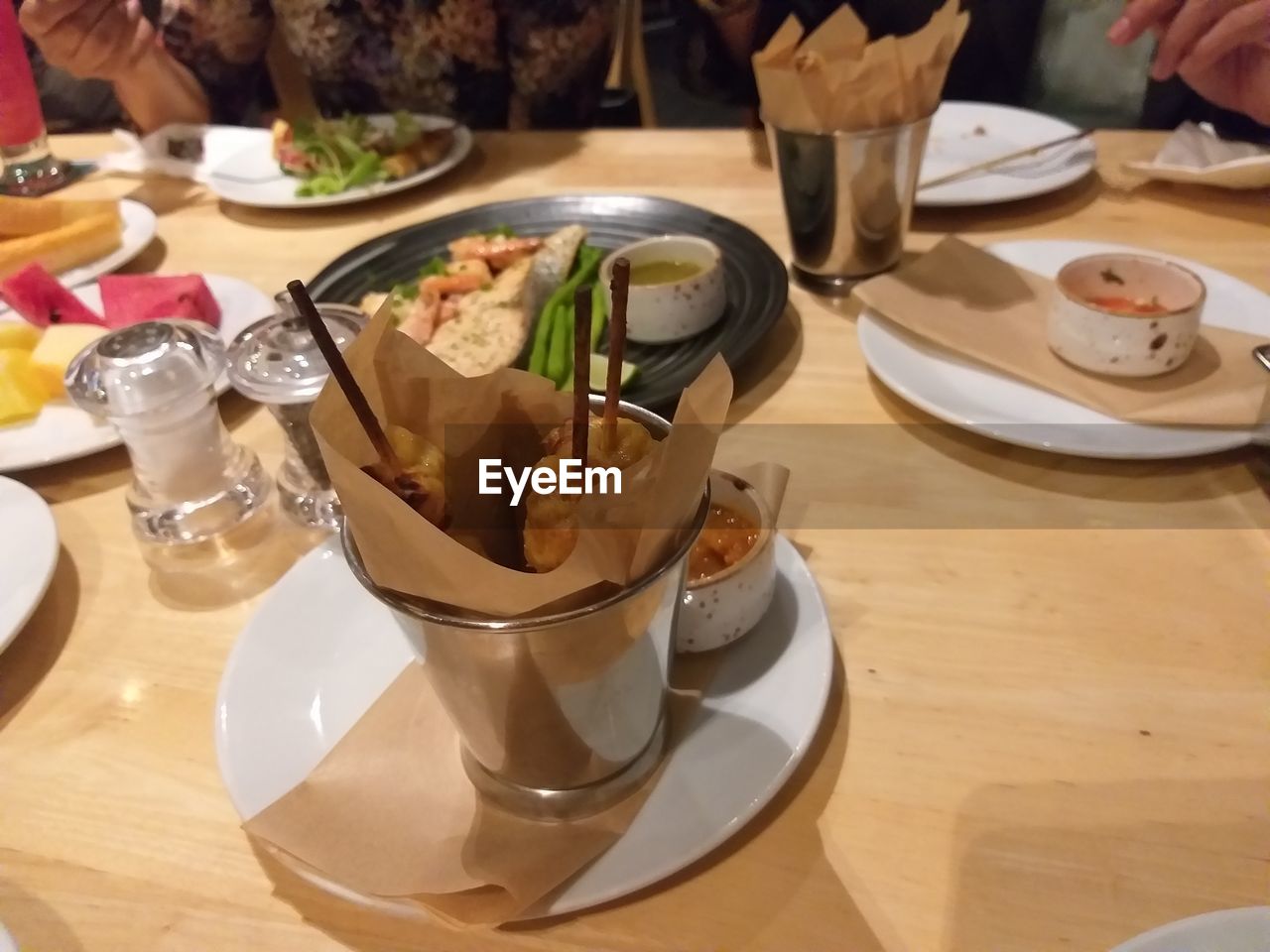 HIGH ANGLE VIEW OF DRINK ON TABLE IN RESTAURANT