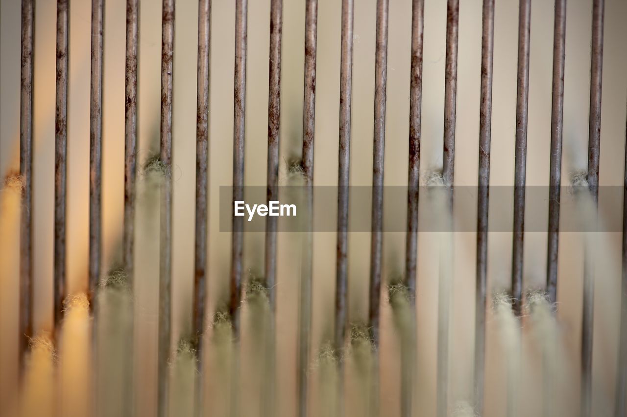 FULL FRAME SHOT OF BAMBOO ON WOOD