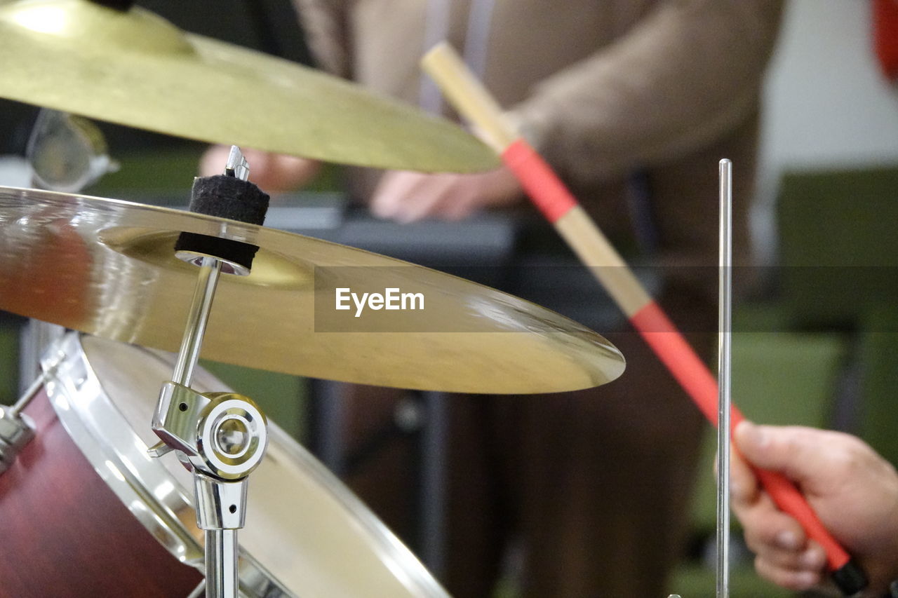 Drumstick with cymbals and drum kit