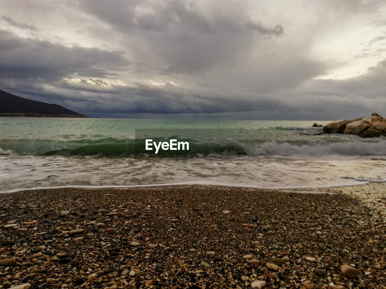 VIEW OF BEACH AGAINST SKY