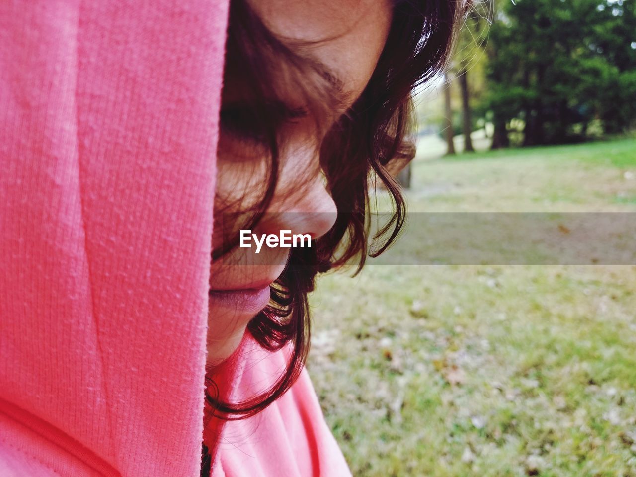 Close-up of girl with hooded shirt