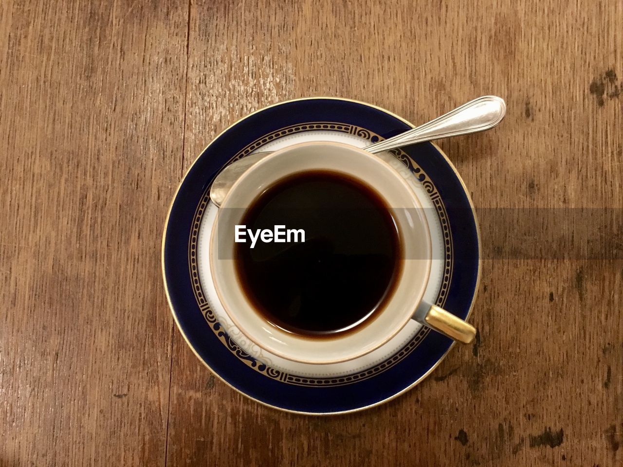 Espresso on wooden table.