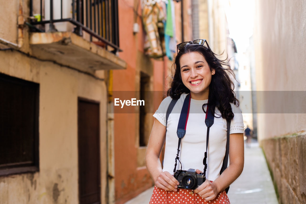 Portrait of smiling young woman