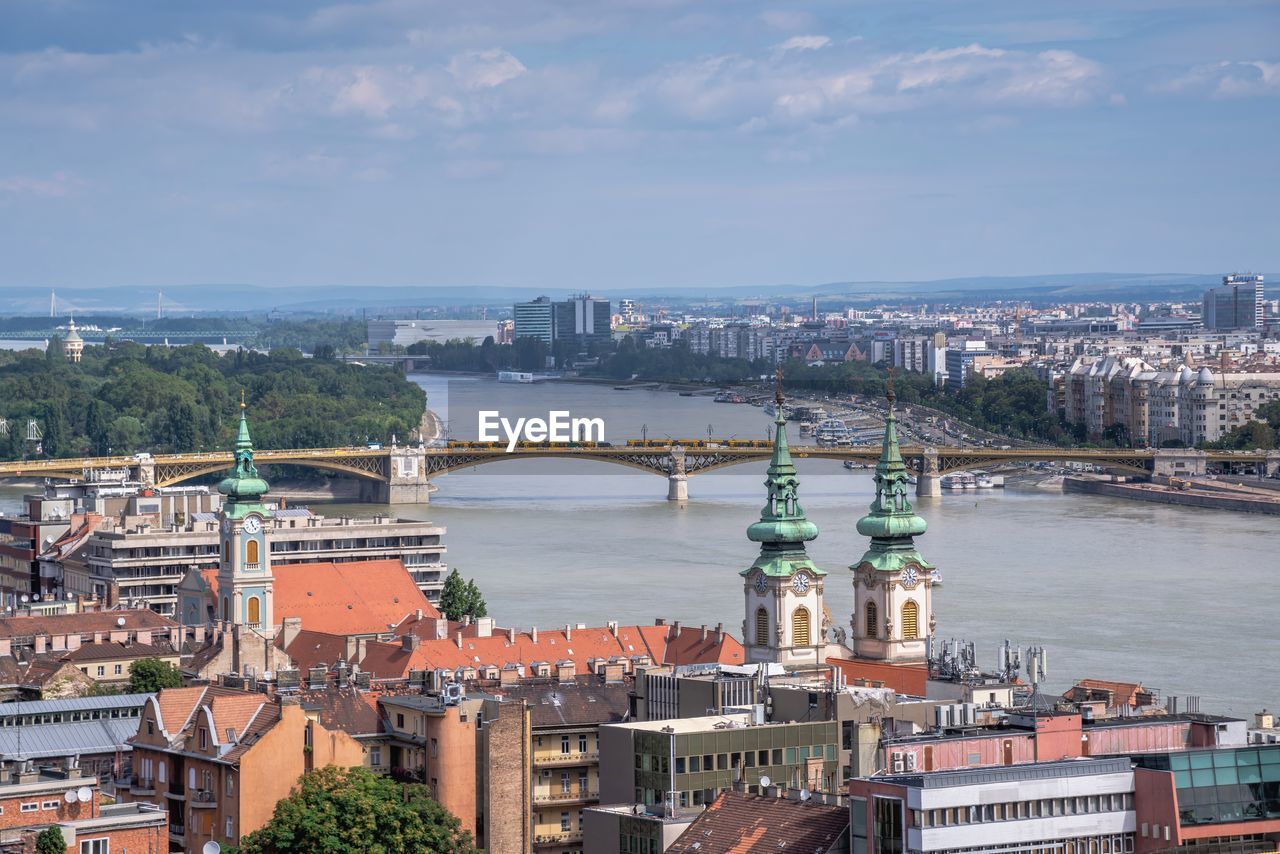 Panoramic view of the danube river and the embankment of budapest, hungary, on a summer morning