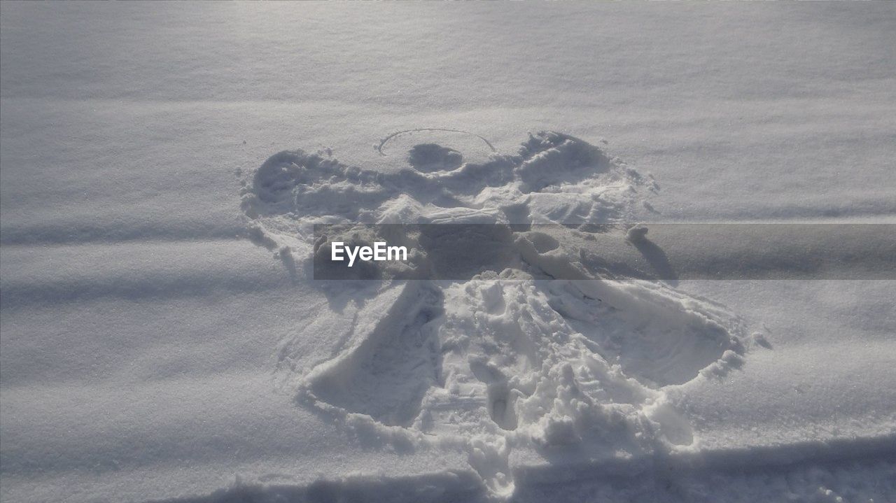 HIGH ANGLE VIEW OF FROZEN SAND