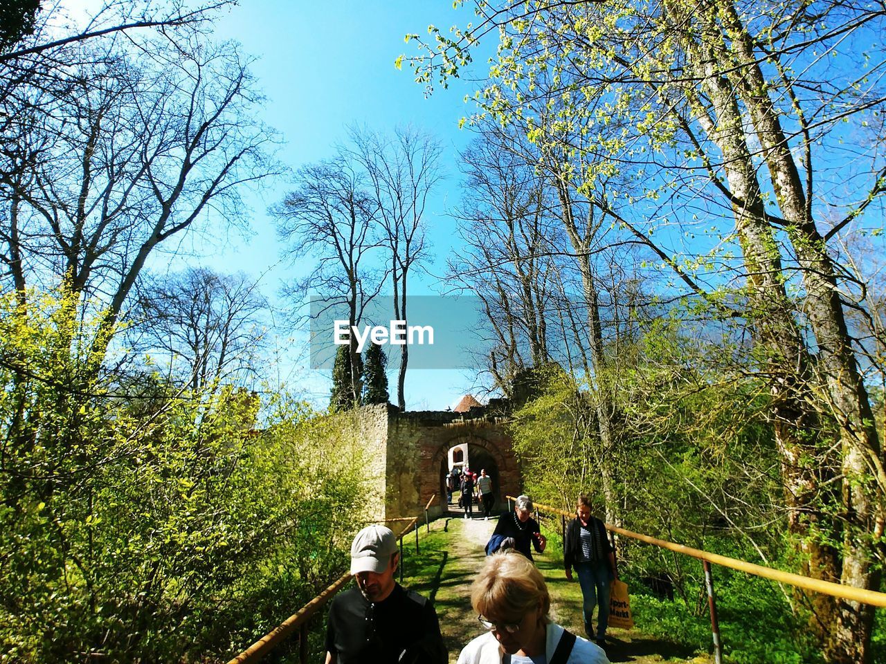 LOW ANGLE VIEW OF PEOPLE IN PARK