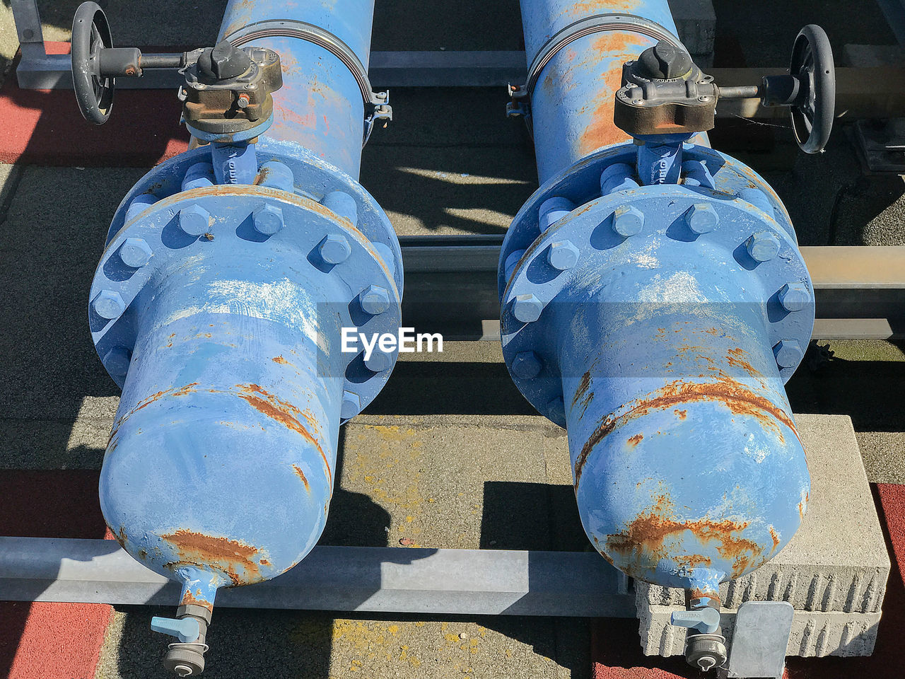 High angle view of pipes on sunny day