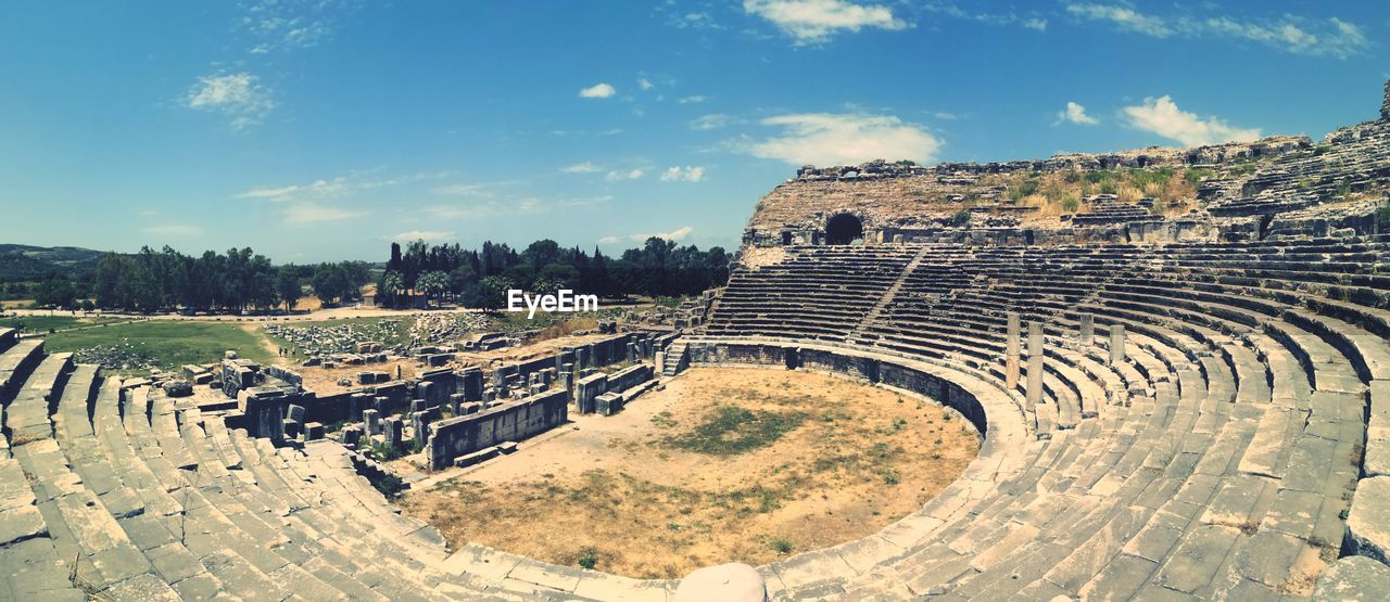 High angle view of old amphitheater against sky