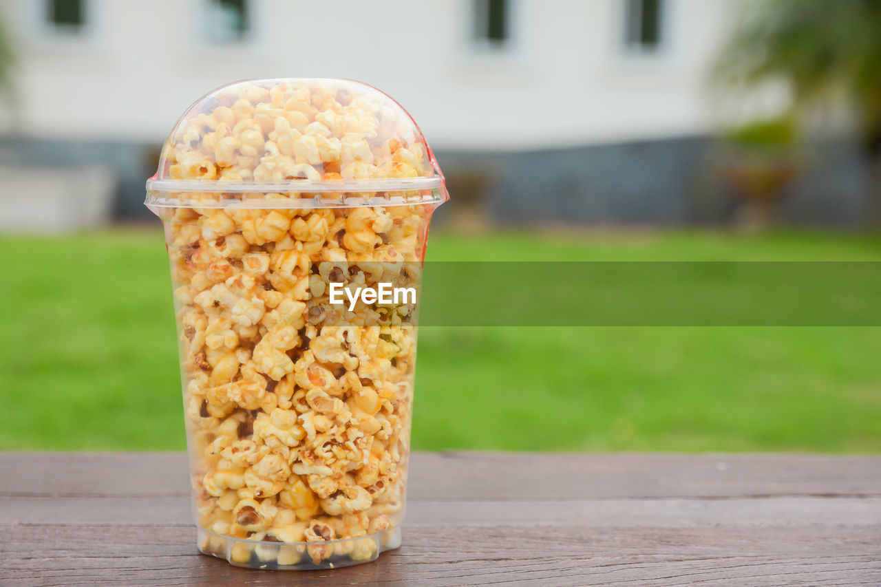 CLOSE-UP OF BREAKFAST ON TABLE AGAINST BLURRED BACKGROUND