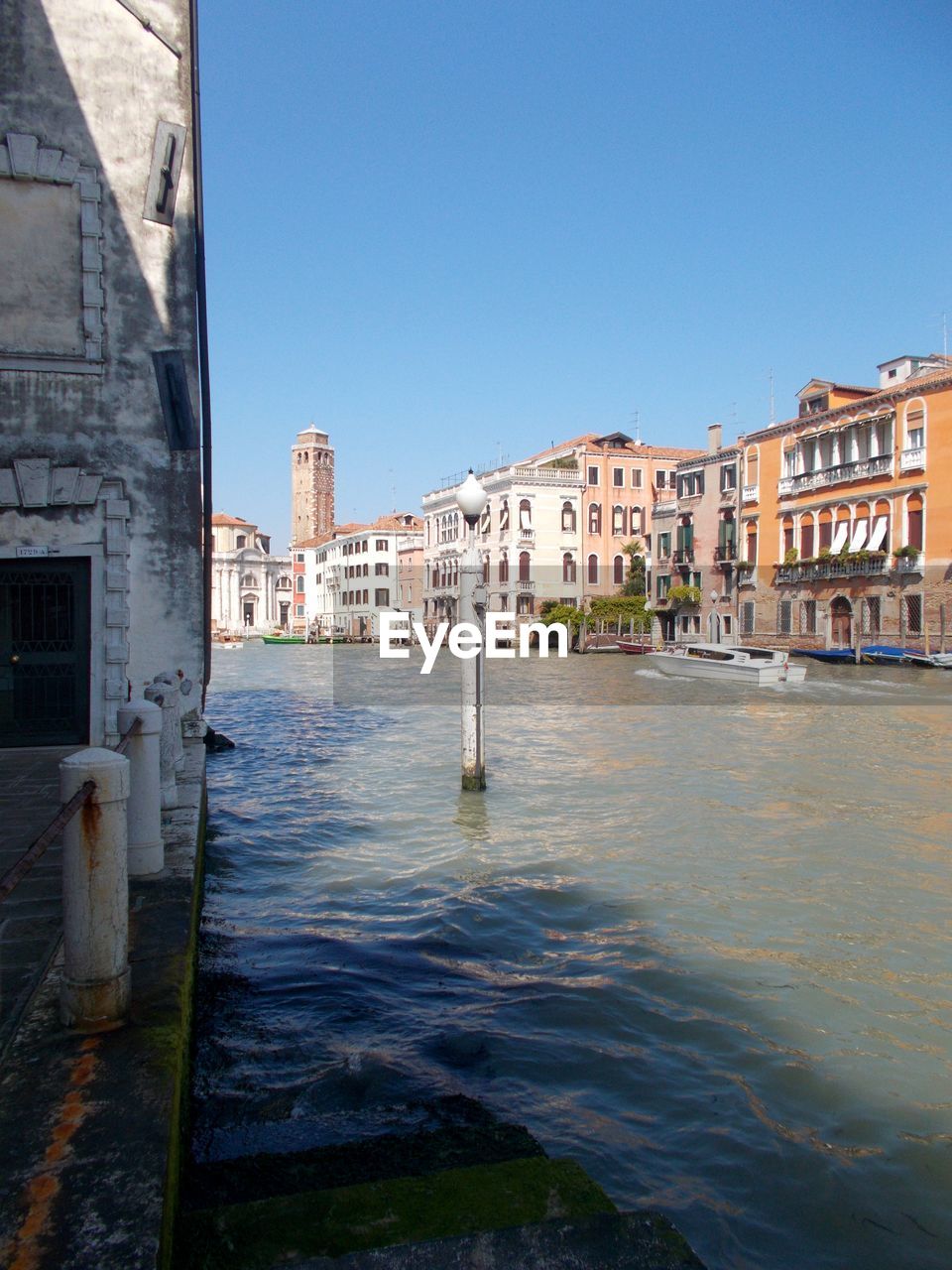 VIEW OF BUILDINGS AGAINST BLUE SKY
