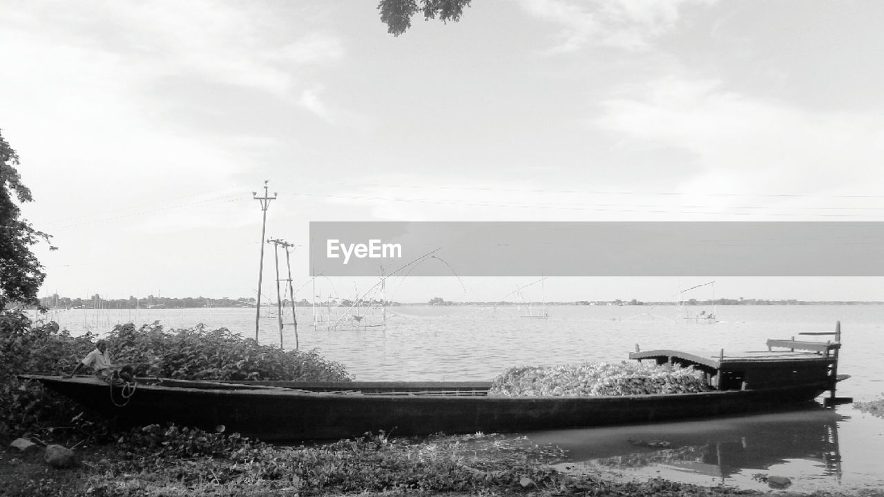 Boats moored in sea