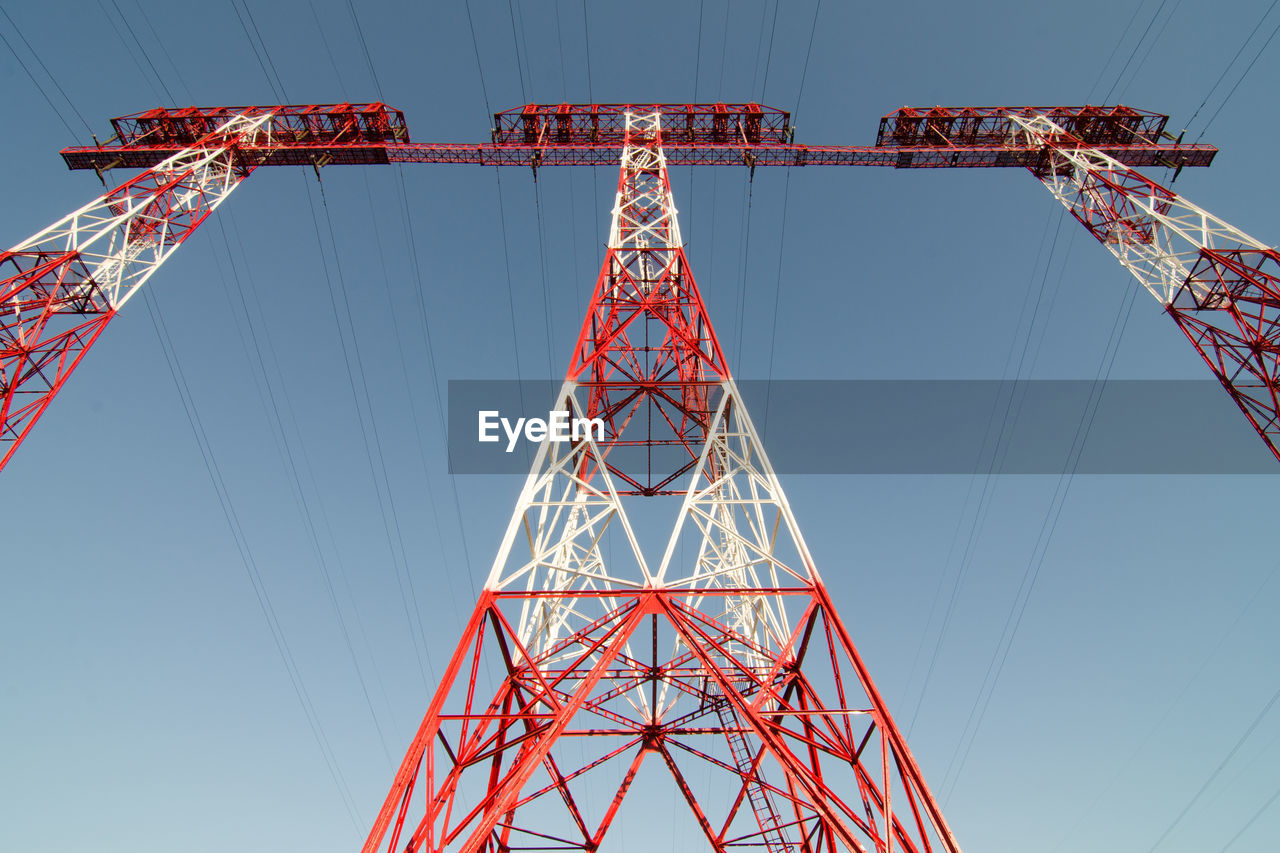 LOW ANGLE VIEW OF COMMUNICATIONS TOWER AGAINST CLEAR SKY