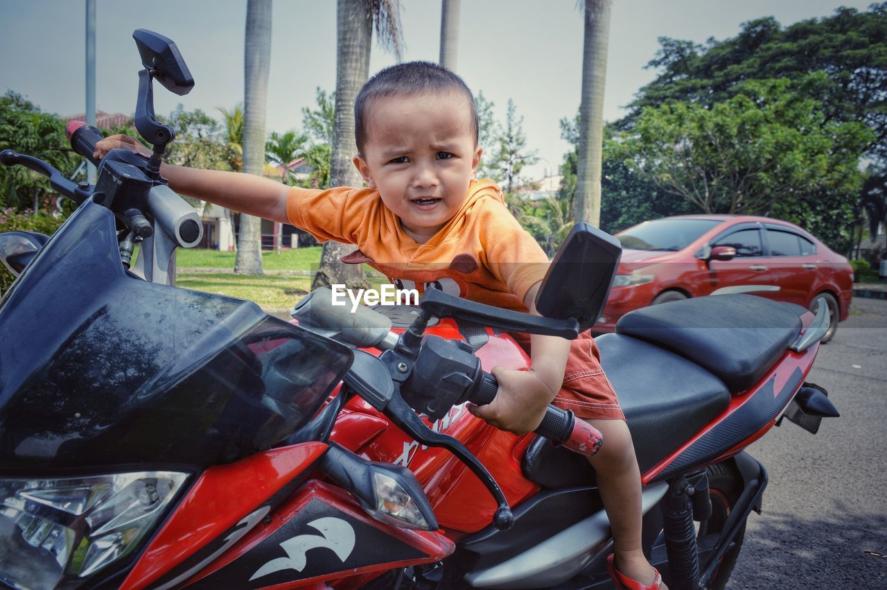 CUTE BOY IN CAR