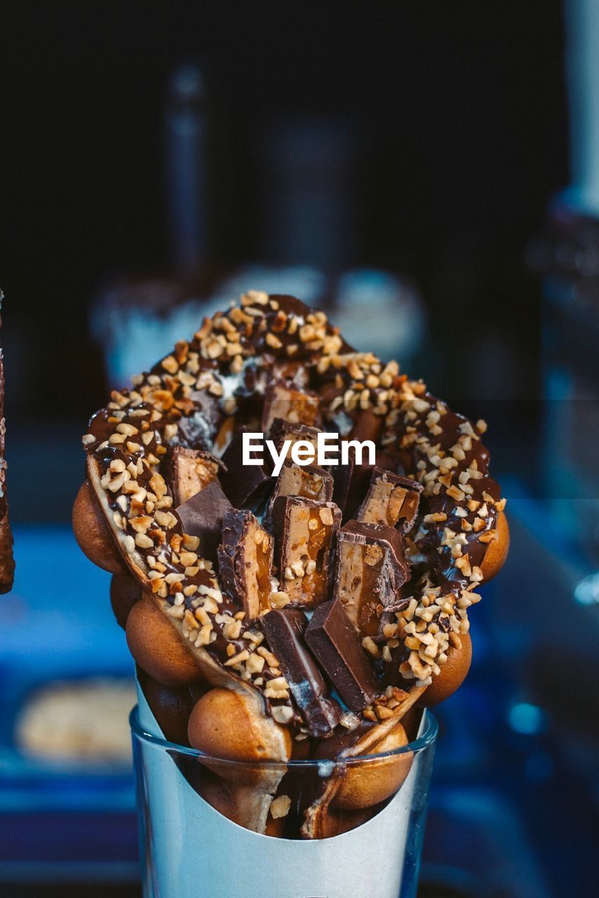 Close-up of chocolate waffle in glass on table