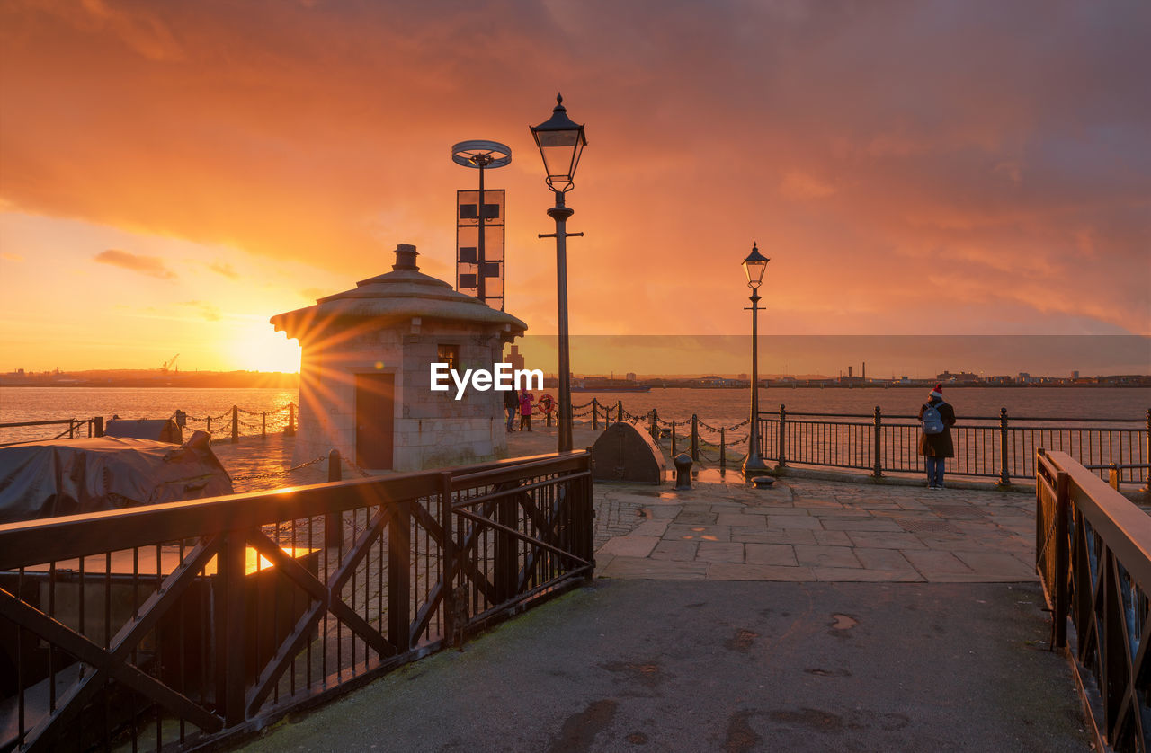 VIEW OF LIGHTHOUSE AT SUNSET