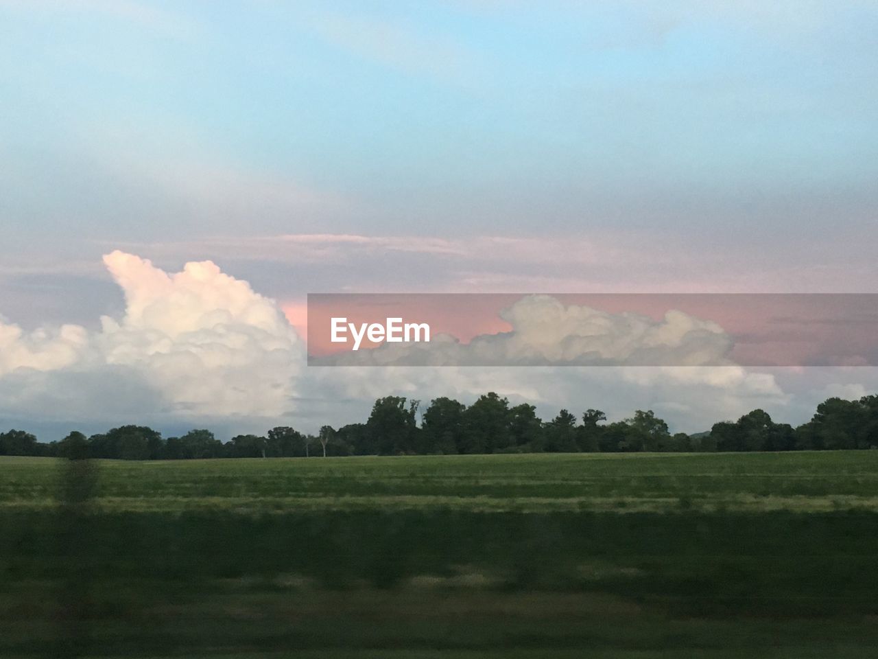 SCENIC VIEW OF LANDSCAPE AGAINST CLOUDY SKY