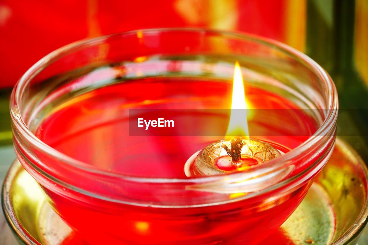 Close-up of lit diya