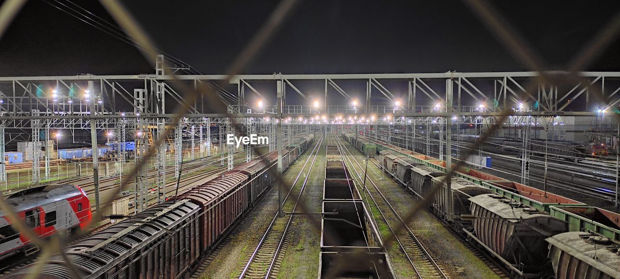 High angle view of trains at shunting yard at night