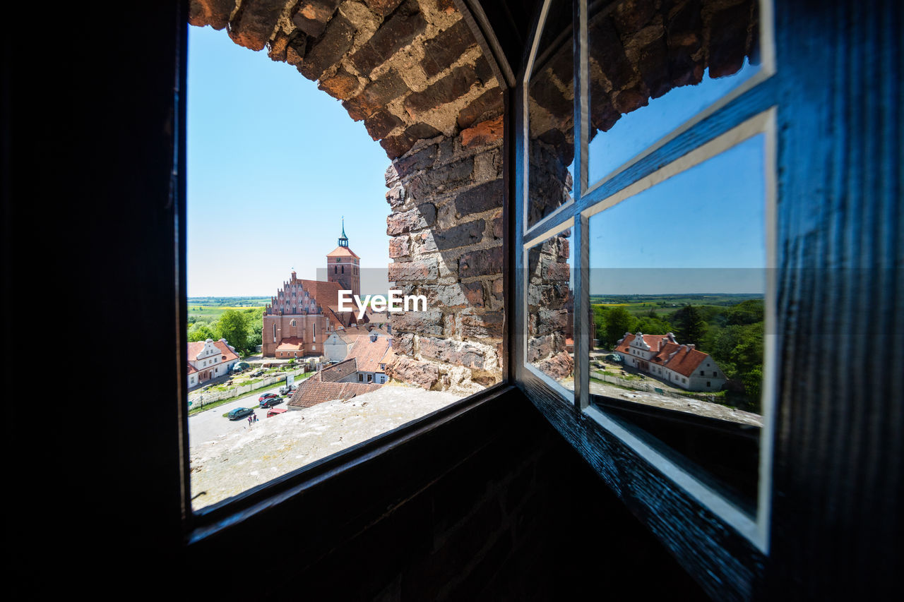 VIEW OF CHURCH THROUGH WINDOW