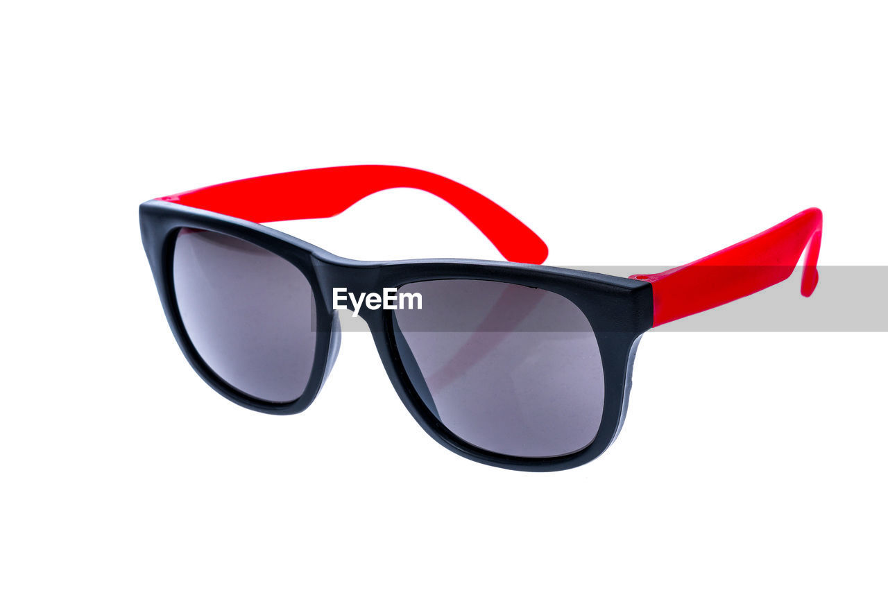 Close-up of sunglasses on white background