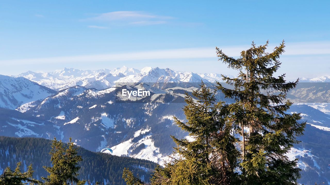 Scenic view of snowcapped mountains against sky