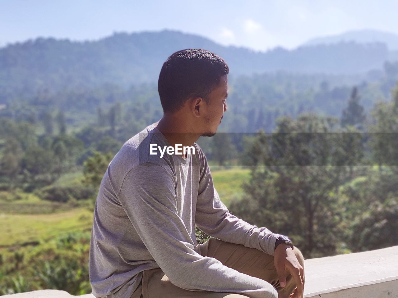 Young man looking at mountain