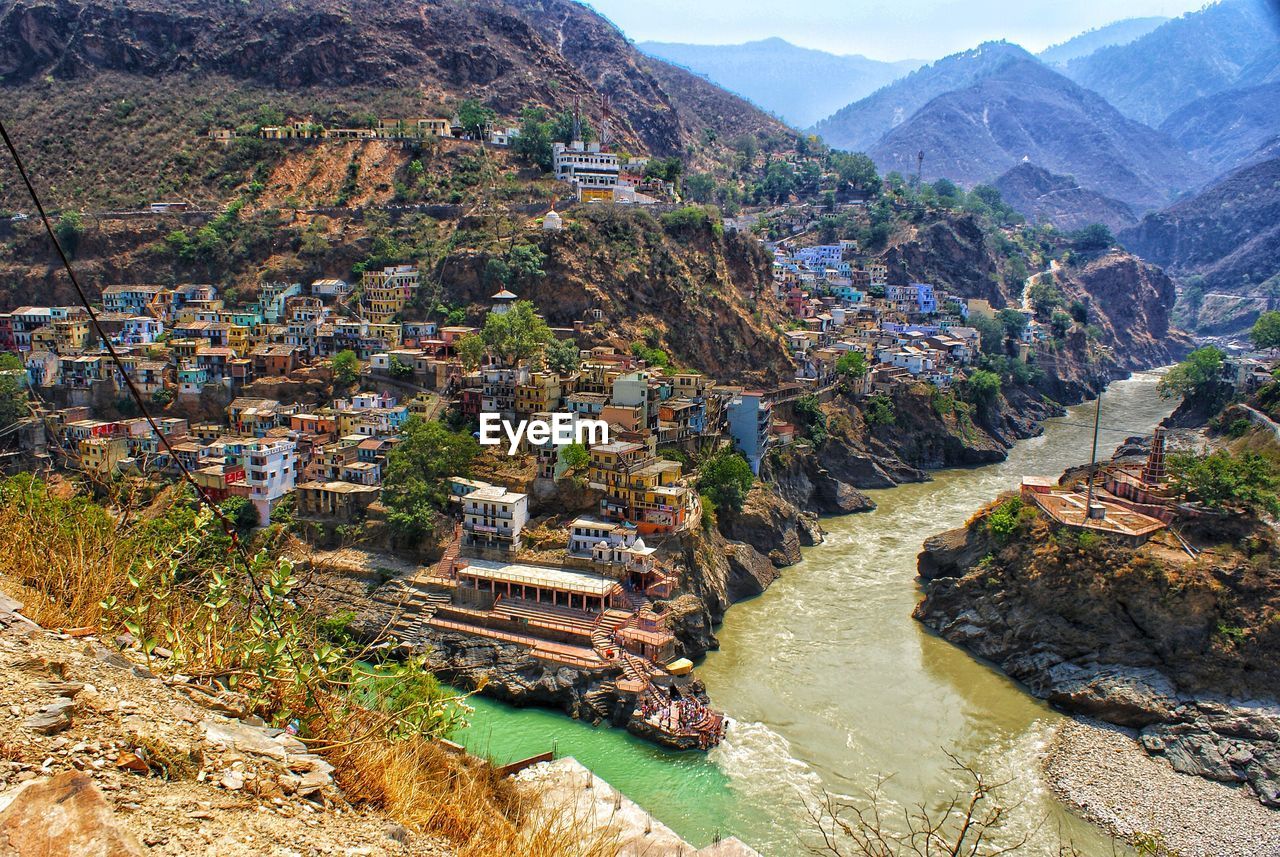 High angle view of river amidst buildings in town