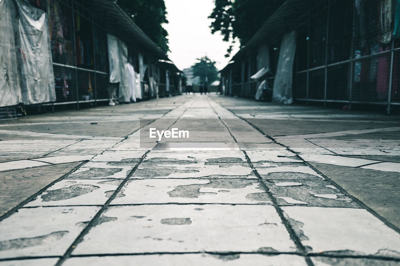 Close-up of cobblestone street in city