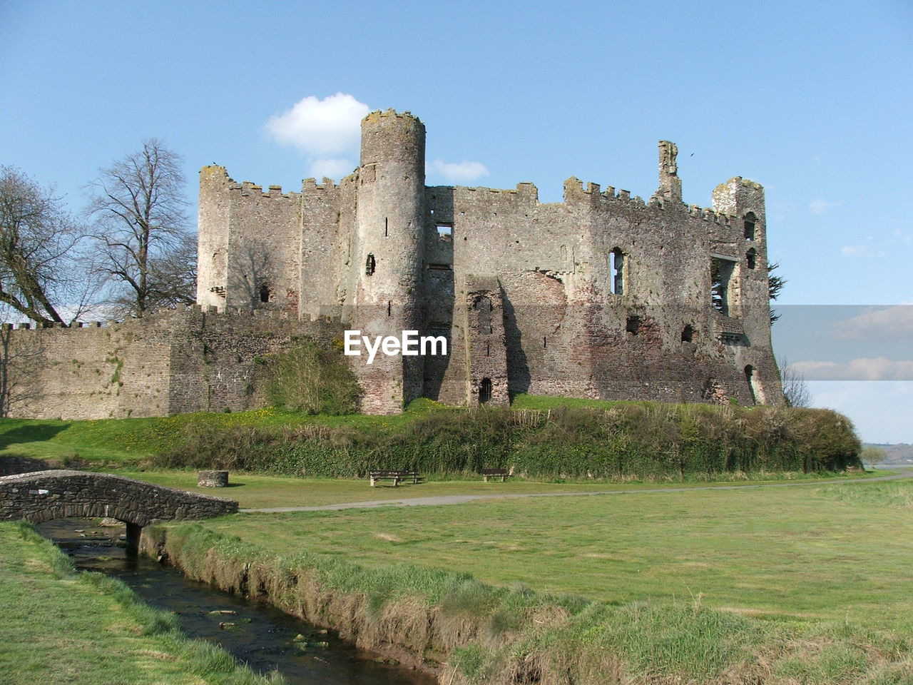 Low angle view of castle against cloudy sky