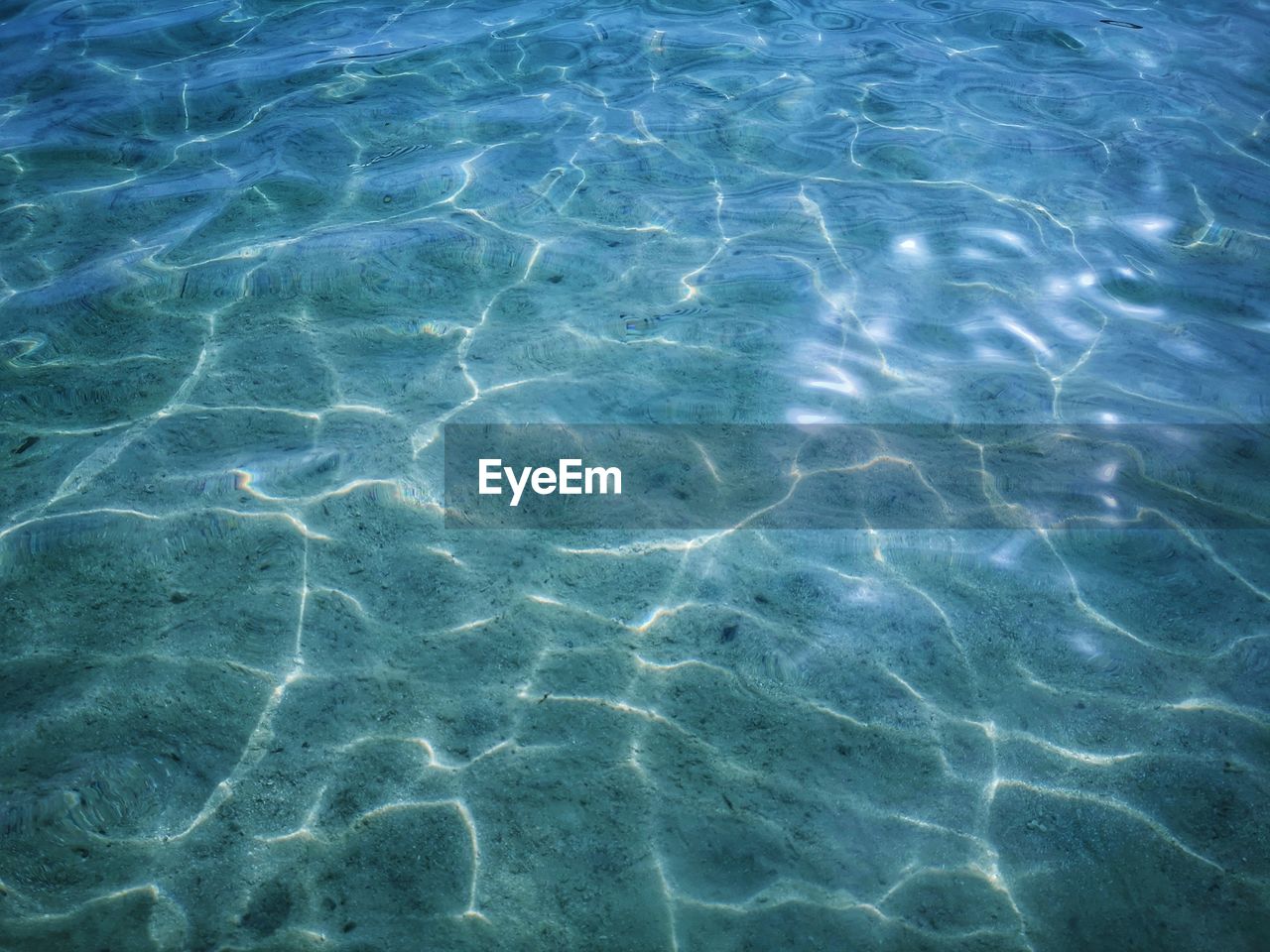 FULL FRAME SHOT OF RIPPLED WATER