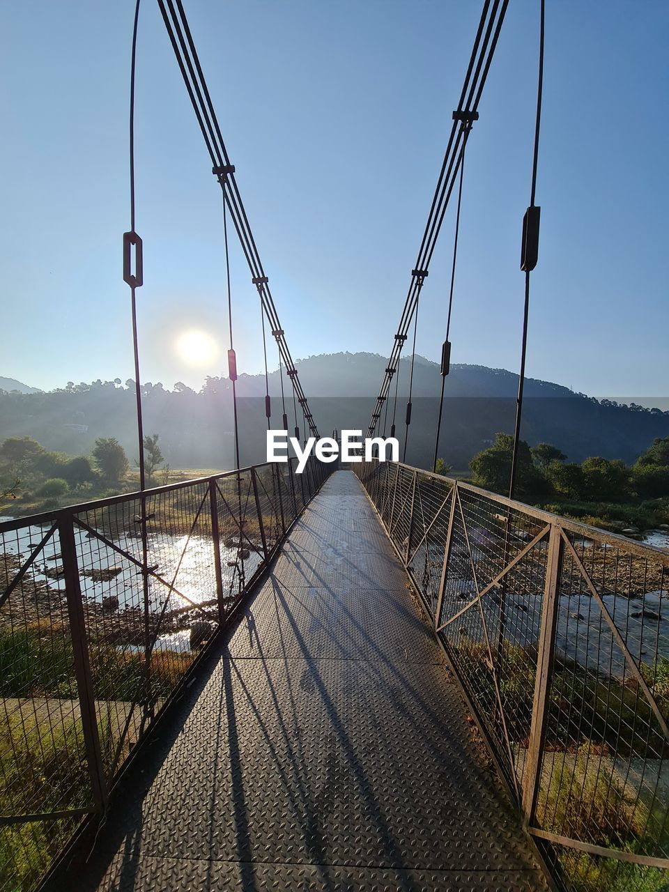 BRIDGE AGAINST SKY DURING SUNSET